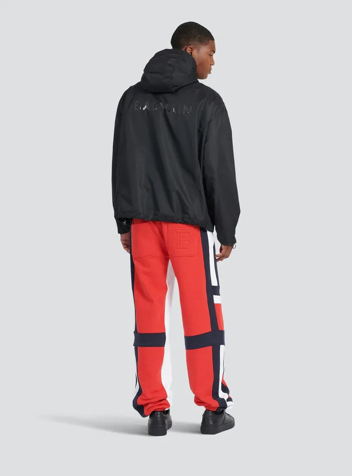 Balmain Outerwear Mens Hooded Nylon Windbreaker With Transparent Balmain Logo Black Balmain Outerwear Mens Hooded Nylon Windbreaker With Transparent Balmain Logo Black