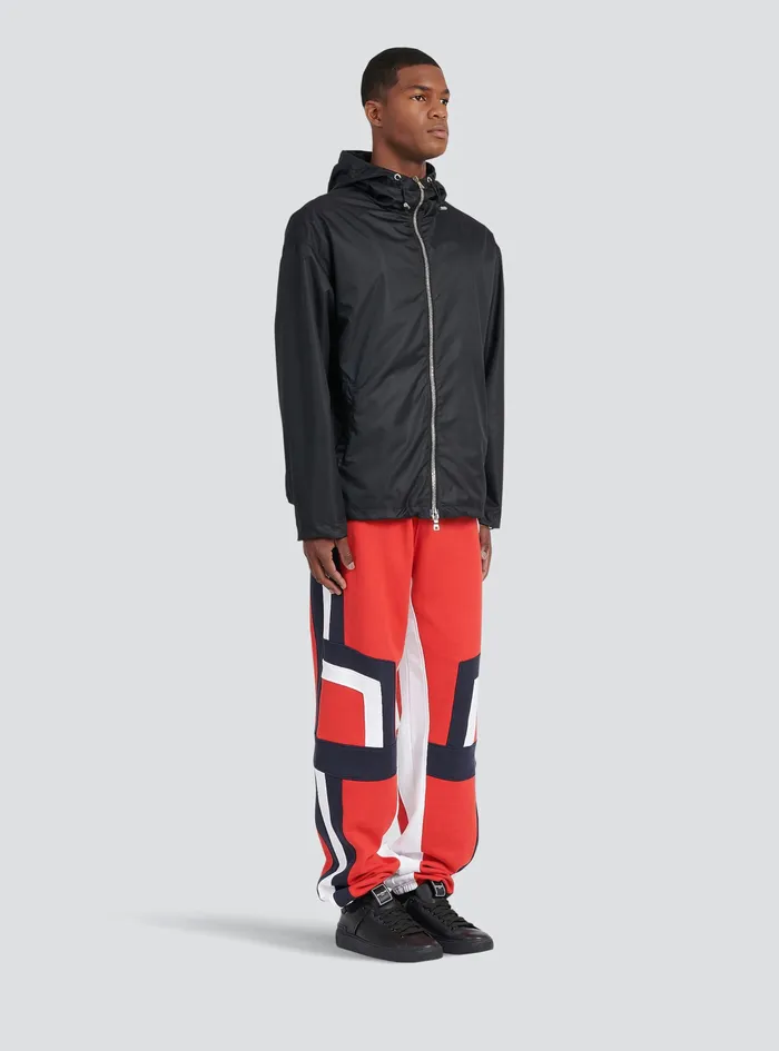 Balmain Outerwear Mens Hooded Nylon Windbreaker With Transparent Balmain Logo Black Balmain Outerwear Mens Hooded Nylon Windbreaker With Transparent Balmain Logo Black