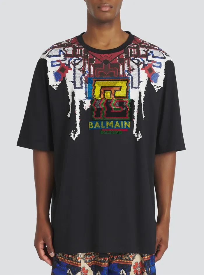 Balmain TShirts Mens Oversized EcoDesigned Cotton TShirt With Multicolor Balmain Logo Print Black Balmain TShirts Mens Oversized EcoDesigned Cotton TShirt With Multicolor Balmain Logo Print Black