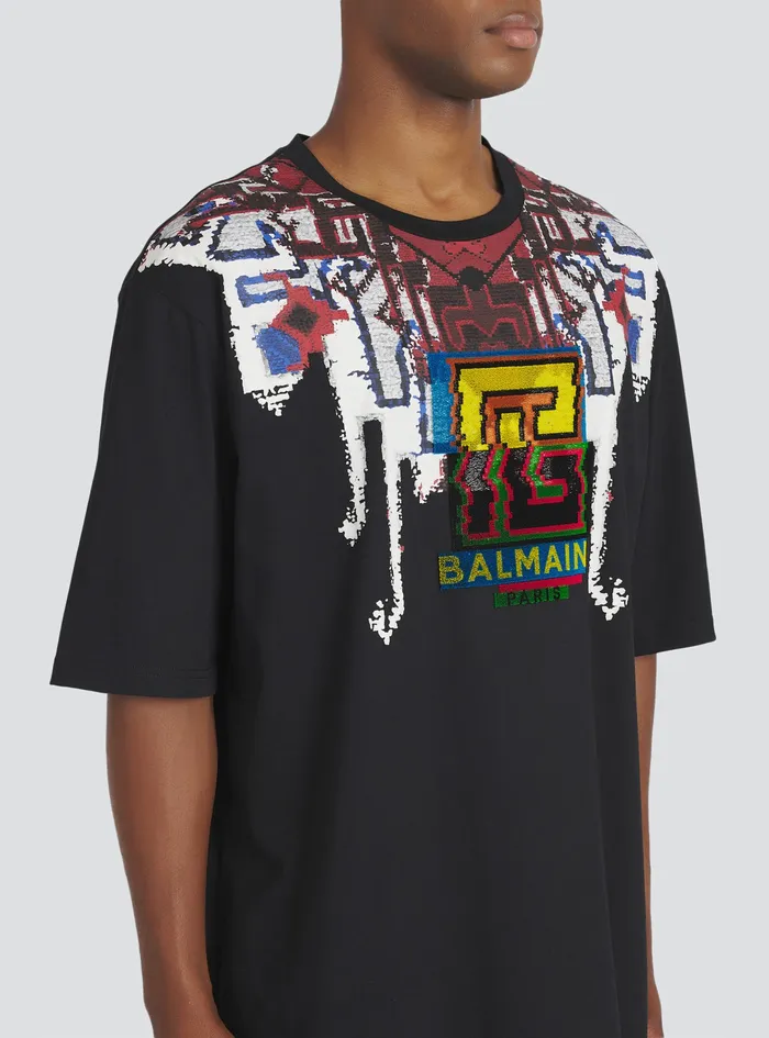 Balmain TShirts Mens Oversized EcoDesigned Cotton TShirt With Multicolor Balmain Logo Print Black Balmain TShirts Mens Oversized EcoDesigned Cotton TShirt With Multicolor Balmain Logo Print Black