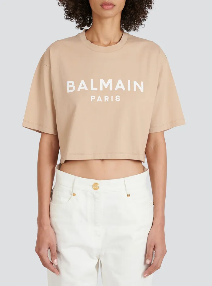 Balmain TShirts Womens Cropped EcoDesigned Cotton TShirt With Balmain Logo Print Beige Balmain TShirts Womens Cropped EcoDesigned Cotton TShirt With Balmain Logo Print Beige
