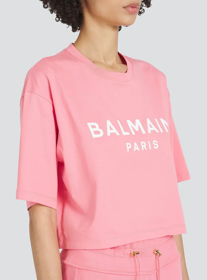 Balmain TShirts Womens Cropped EcoDesigned Cotton TShirt With Balmain Logo Print Pink Balmain TShirts Womens Cropped EcoDesigned Cotton TShirt With Balmain Logo Print Pink