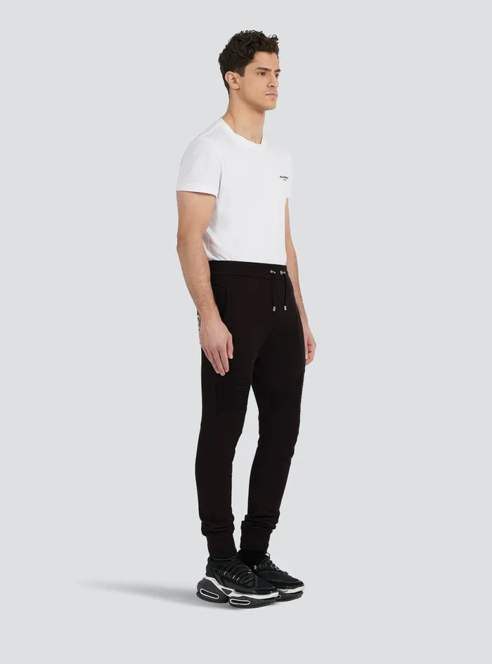 Balmain Trousers And Shorts Mens EcoDesigned Cotton Sweatpants With Balmain Logo Print Gold Balmain Trousers And Shorts Mens EcoDesigned Cotton Sweatpants With Balmain Logo Print Gold