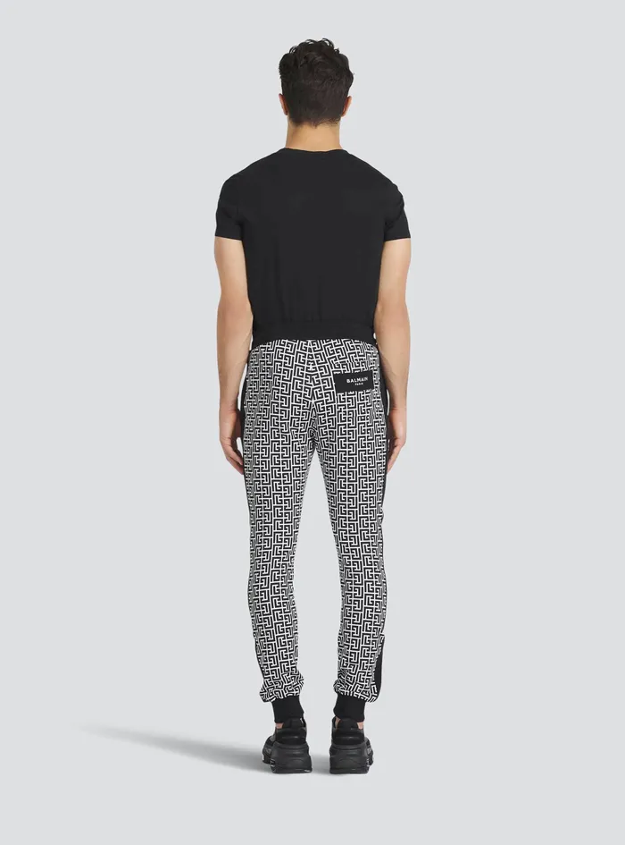 Balmain Trousers And Shorts Mens EcoDesigned Cotton Sweatpants With Balmain Monogram Print Black Balmain Trousers And Shorts Mens EcoDesigned Cotton Sweatpants With Balmain Monogram Print Black