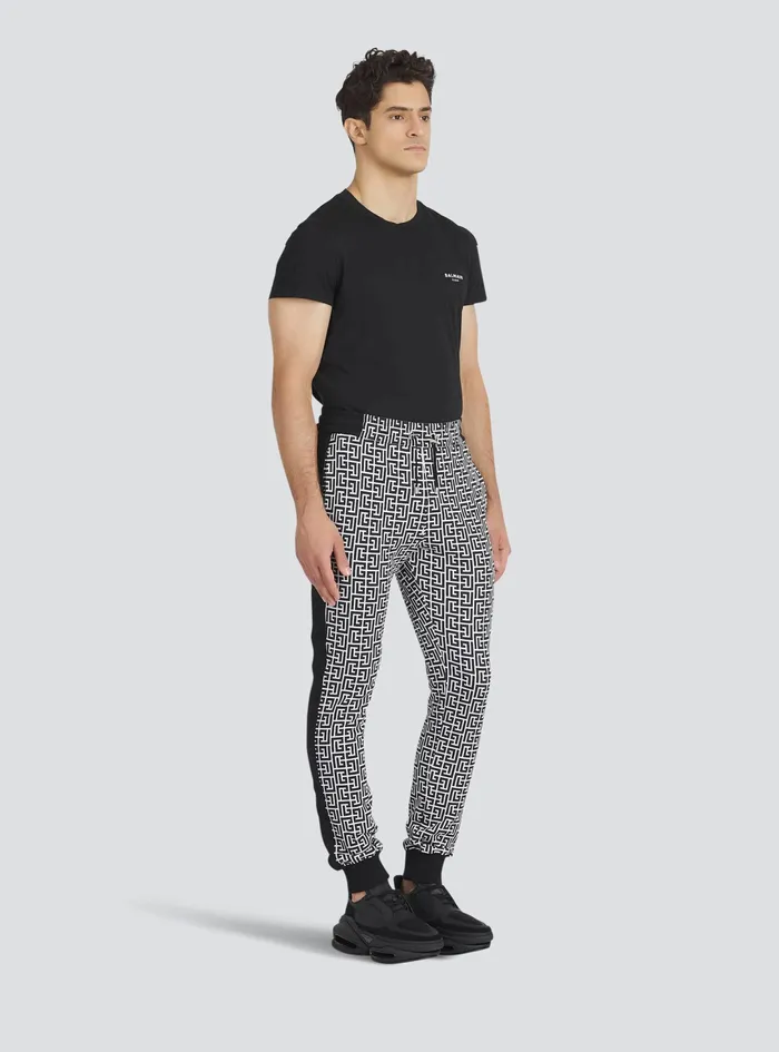 Balmain Trousers And Shorts Mens EcoDesigned Cotton Sweatpants With Balmain Monogram Print Black Balmain Trousers And Shorts Mens EcoDesigned Cotton Sweatpants With Balmain Monogram Print Black