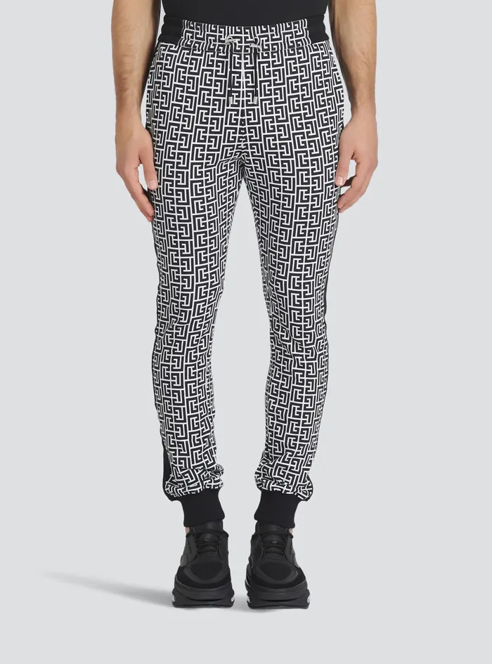Balmain Trousers And Shorts Mens EcoDesigned Cotton Sweatpants With Balmain Monogram Print Black Balmain Trousers And Shorts Mens EcoDesigned Cotton Sweatpants With Balmain Monogram Print Black