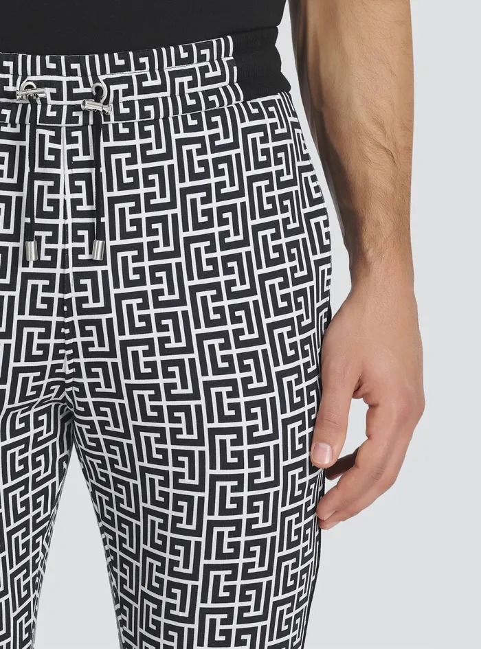 Balmain Trousers And Shorts Mens EcoDesigned Cotton Sweatpants With Balmain Monogram Print Black Balmain Trousers And Shorts Mens EcoDesigned Cotton Sweatpants With Balmain Monogram Print Black