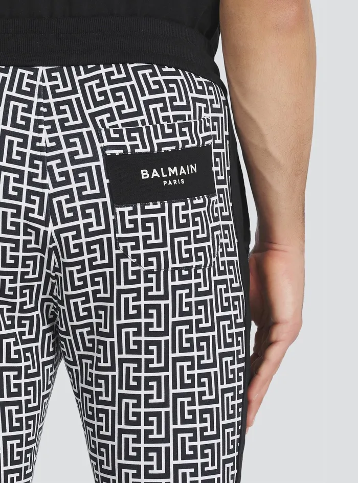 Balmain Trousers And Shorts Mens EcoDesigned Cotton Sweatpants With Balmain Monogram Print Black Balmain Trousers And Shorts Mens EcoDesigned Cotton Sweatpants With Balmain Monogram Print Black